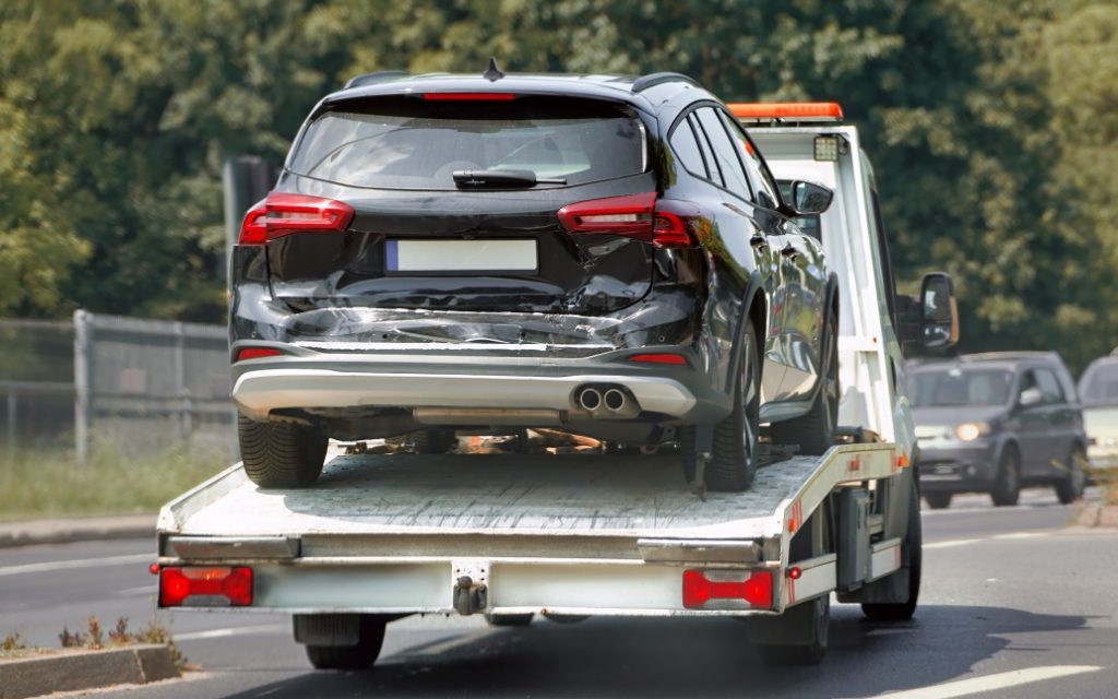 carro sendo transportado