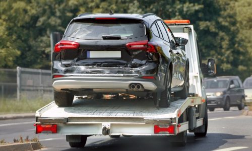 carro sendo transportado